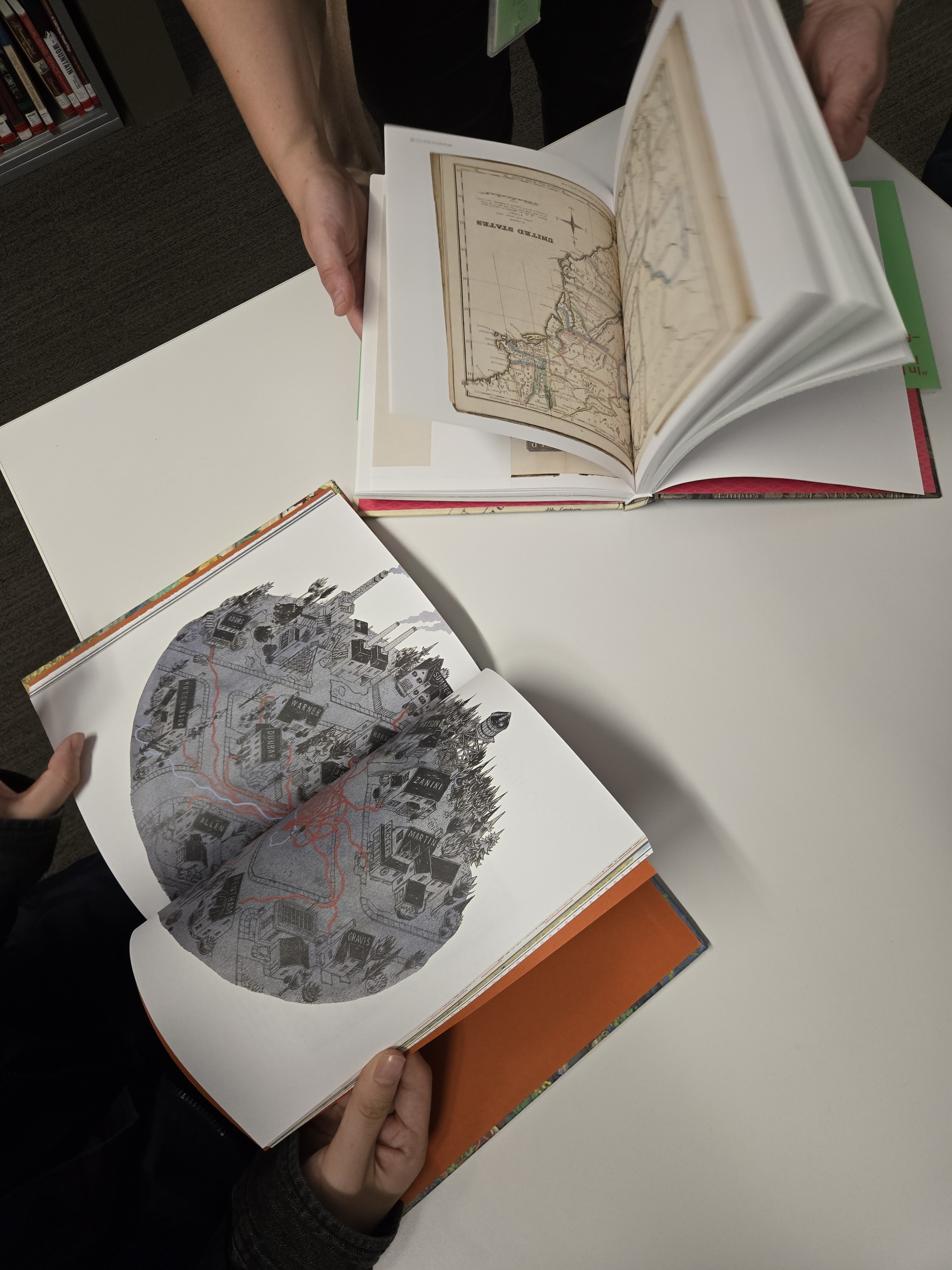 Book pages of drawings that visualize spatiality in creative ways.